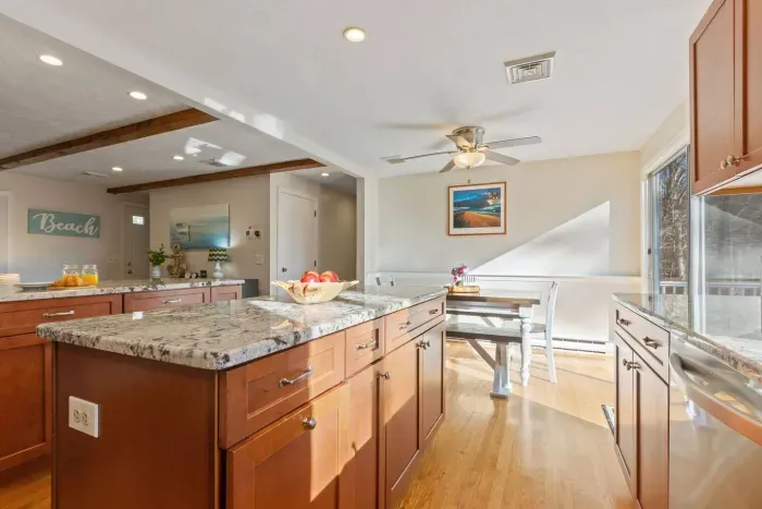 Enjoy the spacious island and breakfast bar for easy meal prep and casual dining