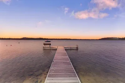 Enjoy sweeping sunset vistas and painted skies from our long, long pond dock