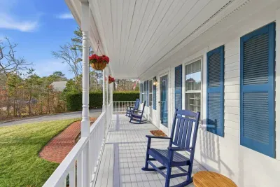 Start your vacation days on our classic Cape Cod's porch.