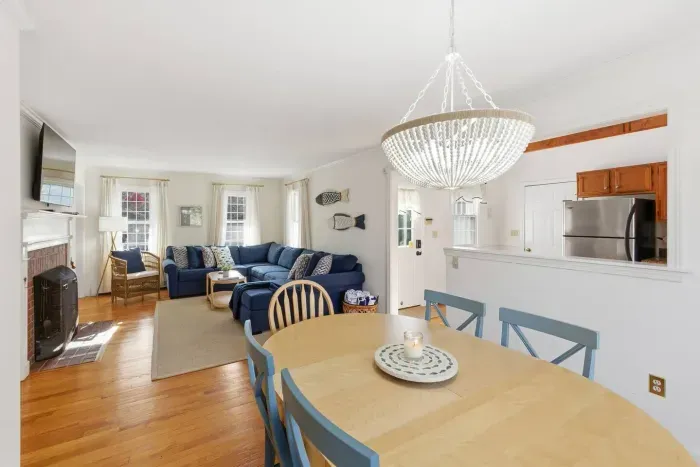 The open flow to the dining area ensures that whether you’re playing a board game or sharing a meal, everyone is part of the memories