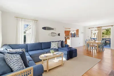 Come home to a living room that feels like a breath of fresh air after a day biking the Cape Rail Trail