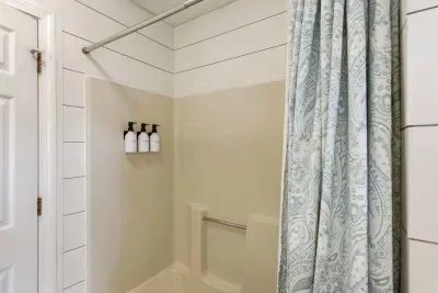 Leave the heavy bottles at home! We’ve fully stocked our walk-in shower with high-quality shampoo, conditioner, and body wash dispensers to make your stay as easy as a summer breeze.