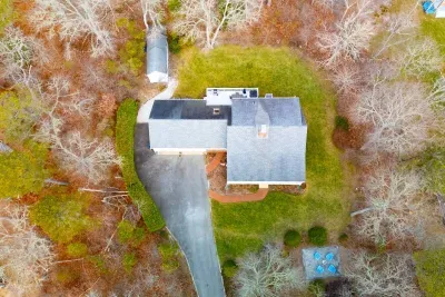 I love using aerial photos like this because they perfectly reveal the house layout, helping you visualize the flow of the space before you even arrive
