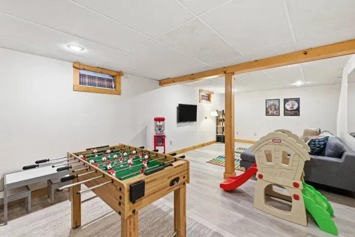 Whether it's a friendly foosball tournament, movie night, or letting the little ones explore the playhouse, our lower-level game room ensures the fun never stops.