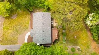 Private wooded retreat with spacious yard and relaxing outdoor deck