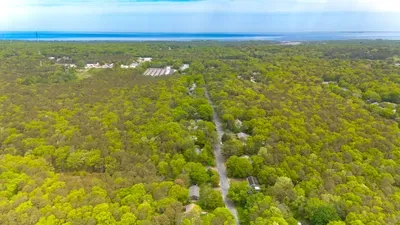 Peaceful wooded retreat with beach access nearby and scenic coastal views