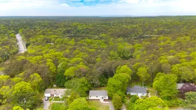 Peaceful wooded setting with privacy and scenic aerial views