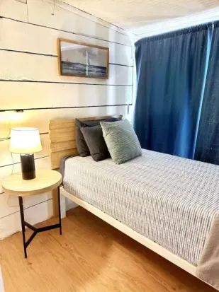The rear bedroom, unit A