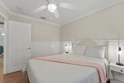 Bedroom unit A, Queen bed, celling fan.