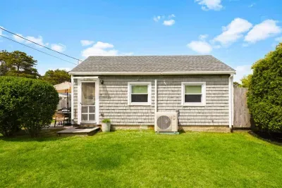 The backyard is a shared space with the Lobster Pot Getaway unit.