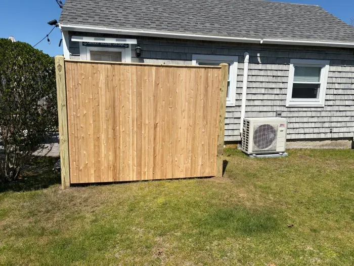 Fresh privacy enclosure adds a clean look to the outdoor yard space