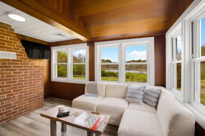 The living room overlooks the peaceful pond.