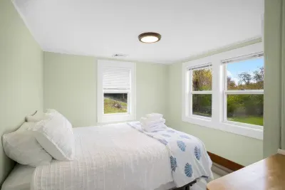 Rest while taking in the stunning pond view.
