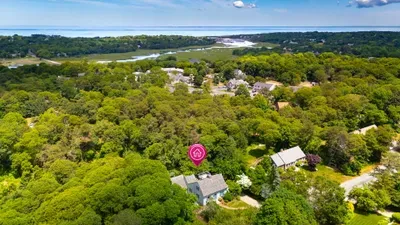 Private tree-lined retreat with scenic marsh and water views