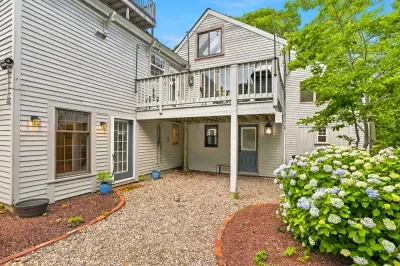 Charming private courtyard with upper deck and blooming hydrangeas