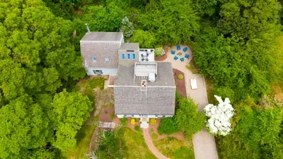 Private wooded retreat with fire pit patio and spacious outdoor grounds