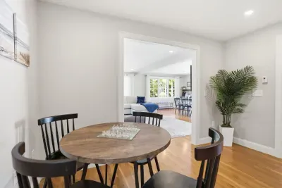 Picture your mornings here: the scent of fresh coffee, sunbeams bouncing off warm hardwood, and a gentle breeze flowing in from the living room. It's the ultimate spot to plan your day's adventures over a slow, lazy breakfast.