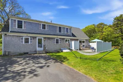 Classic coastal charm from the moment you pull up. Run your toes through the lush green grass, sink into the patio seating, and let the outside world melt away behind the privacy of your own timeless, shingle-style sanctuary.