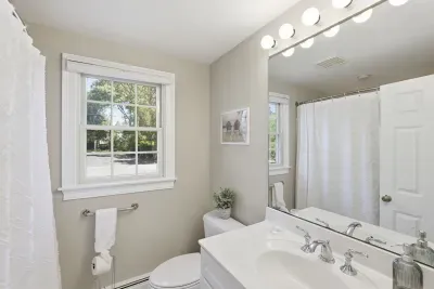 Your private, airy oasis. Unpack your favorite toiletries onto the spacious counter, breathe in the bright atmosphere, and indulge in a long, hot rinse after a day of exploring.