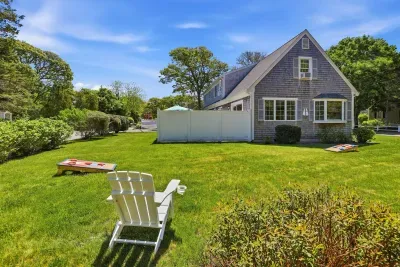 Long, golden afternoons spent exactly how you remember them. Sink into a classic Adirondack chair with a cold drink, listen to the laughter of a competitive cornhole match, and let the world slow down on the sprawling green lawn.