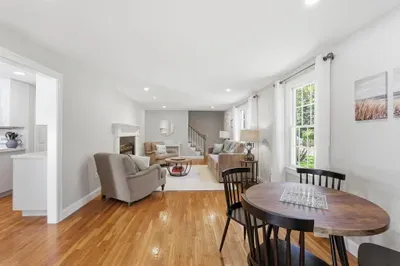 Sunbeams bouncing off polished wood, the promise of a crackling fire, and a cozy nook waiting for your morning coffee. This seamless, sun-drenched space is the perfect backdrop for making memories together.