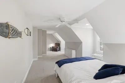 Sleep among the stars under dramatic vaulted ceilings, then wake up to sunbeams flooding your private loft. With a hidden reading nook waiting for your morning coffee, this is the ultimate sanctuary for slow, peaceful days.