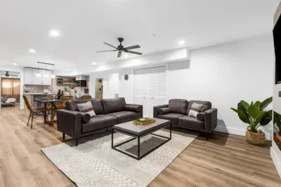 Basement livingroom and open concept dining and kitchenette 