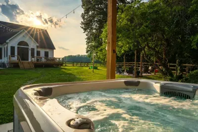 Relax in the spa after a day of exploring, surrounded by mature trees and the peaceful sounds of nature.