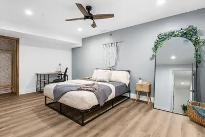 Queen bedroom with private work station