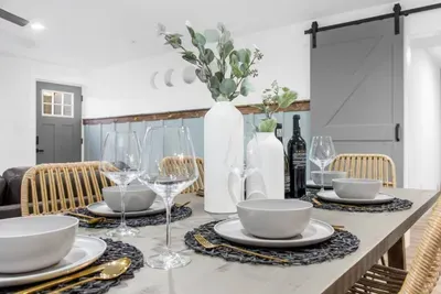 Have a glass of wine with friends and family in our cozy basement dining area