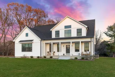 Enjoy relaxing sunsets from the porch swing that overlooks the western sky over 150 acres of farm fields 