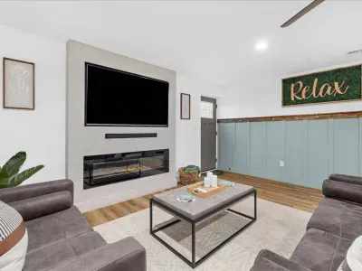Living room #2 located in the basement portion of the house.