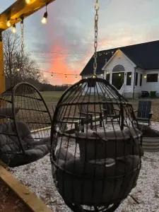 Take a swing on our egg chairs while making smores with the family 