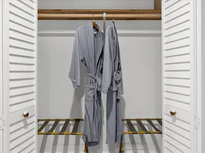 Every bedroom comes stocked with robes for all guests!