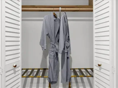 Every bedroom comes stocked with robes for all guests!
