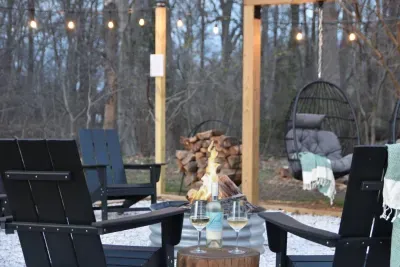 Grab a glass of wine and enjoy those beautiful summer nights by the cozy firepit with seating for 10!