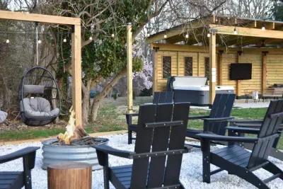Sit by the fire or relax in our 8-person hot tub under the cover of the pergola!