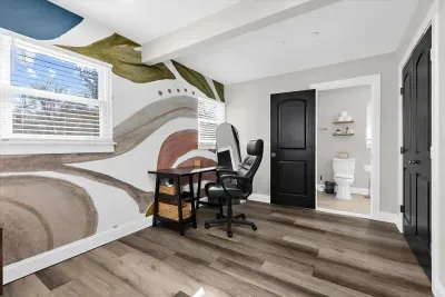 For those guests looking to catch up on work while visiting, there is a desk and desk chair located in the master bedroom.