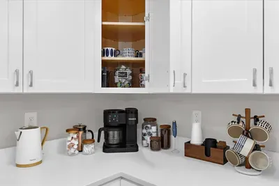 Enjoy a coffee from our fully stocked coffee bar equipped with coffee pods, grounds, beans, a Keurig duo, French press, frother, etc. to ensure a perfect start to every morning!