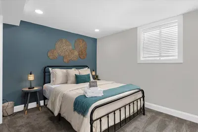 Bedroom #3 equipped with a queen foam mattress, closet, and luggage rack.