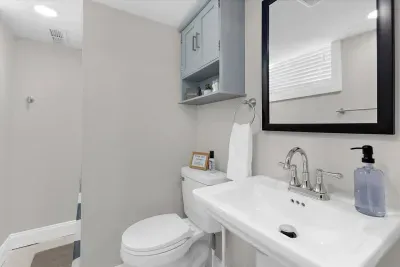 Bathroom #3 with walk in shower located in the lower level of the house.