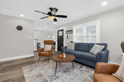 Spacious upstairs living room just steps away from the dining room and kitchen area.