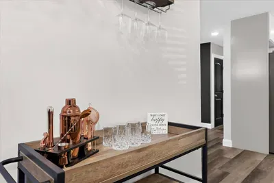 Wine glasses and bourbon glasses provided on the bar cart located in the upstairs dining room.