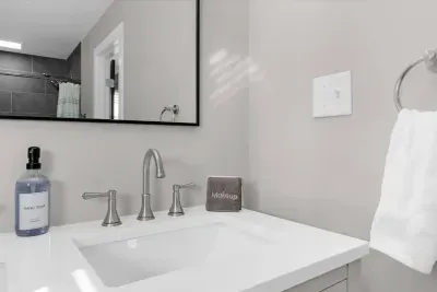 Enjoy a slow, comfortable start to your morning with the convenience of a full bathroom in the master bedroom.