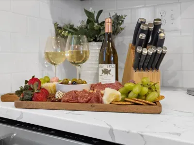Grab a bottle of wine and some snacks and enjoy a cozy night in with our fully stocked kitchen, set up for entertaining friends and family!
