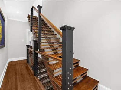 The stairwell which connects the 2nd floor bedroom to the 3rd floor bedroom.