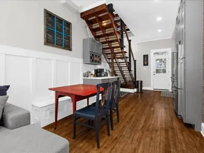 Pull up a chair and grab a bite to eat or cook at home in our fully stocked kitchen with open concept dining room and living room areas.