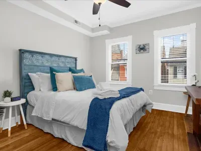 Bedroom #1, equipped with a comfortable Queen size mattress, smart TV, and attached private full bathroom with walk in shower!