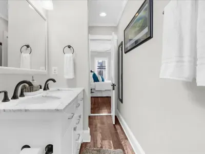 Bathroom #1 has a double vanity to ensure there is plenty of counterspace for everyone visiting!