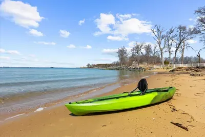 Community beach directly next door to property.